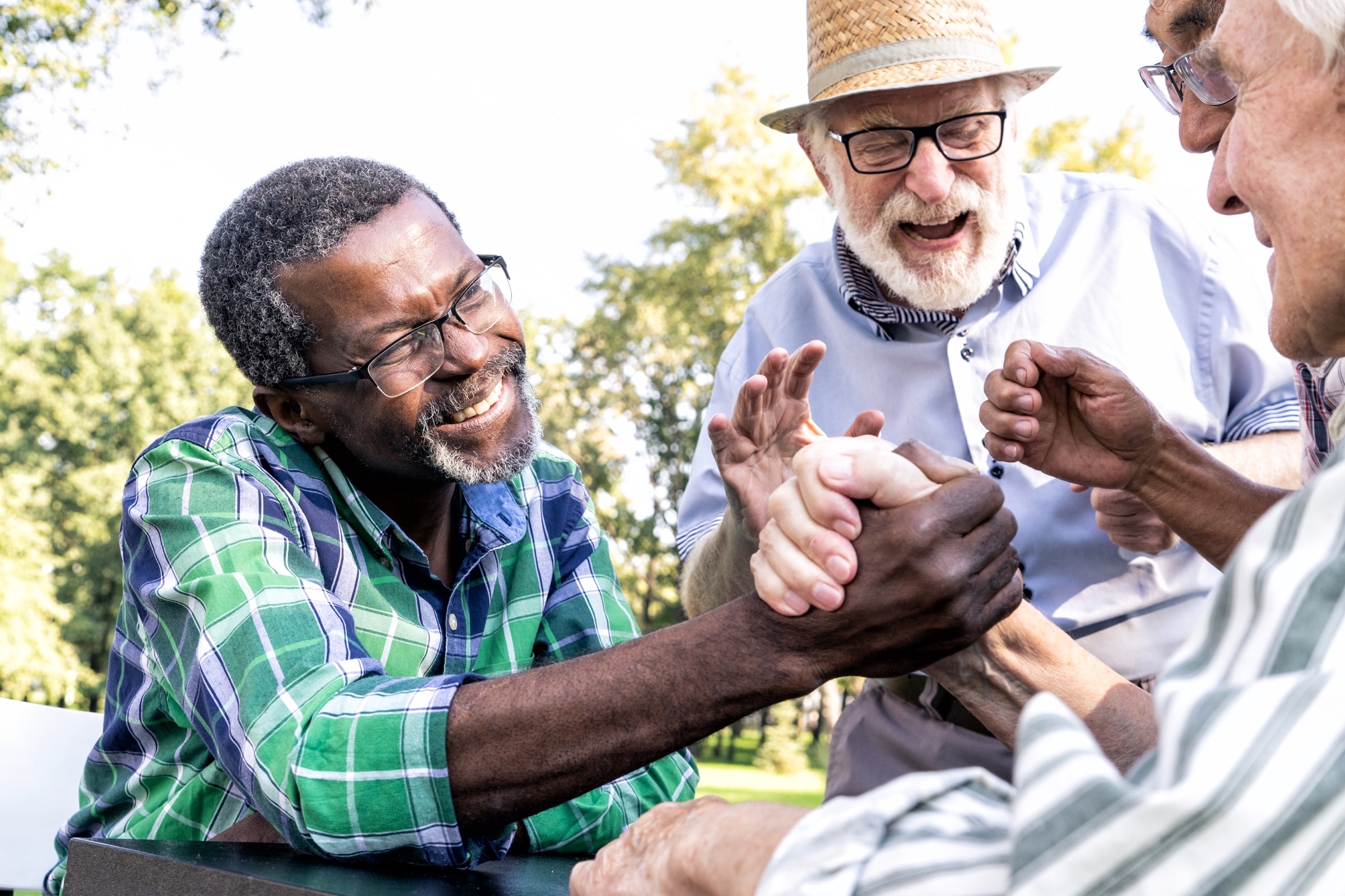 Seniors sharing friendship and joy outdoors